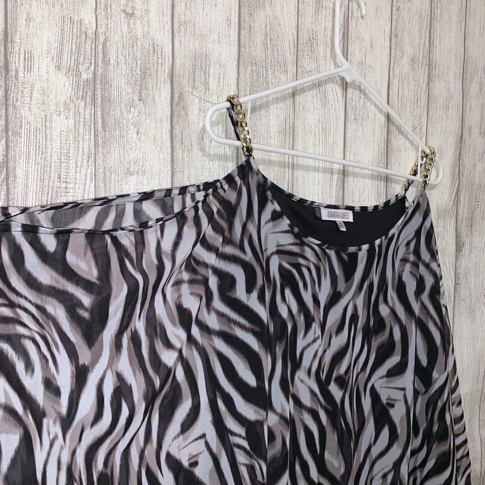 Jennifer Lopez open shoulder top